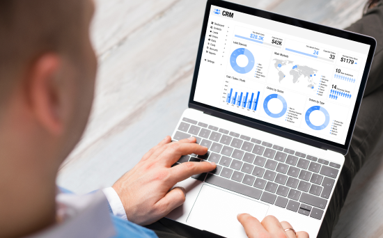 Team using CRM on Macbook Pro